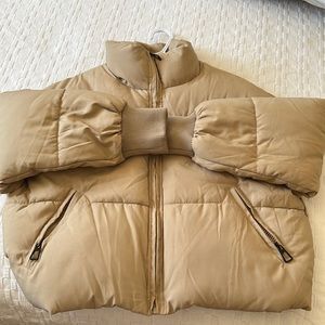 Oversized puffer , color tan, size medium, never worn